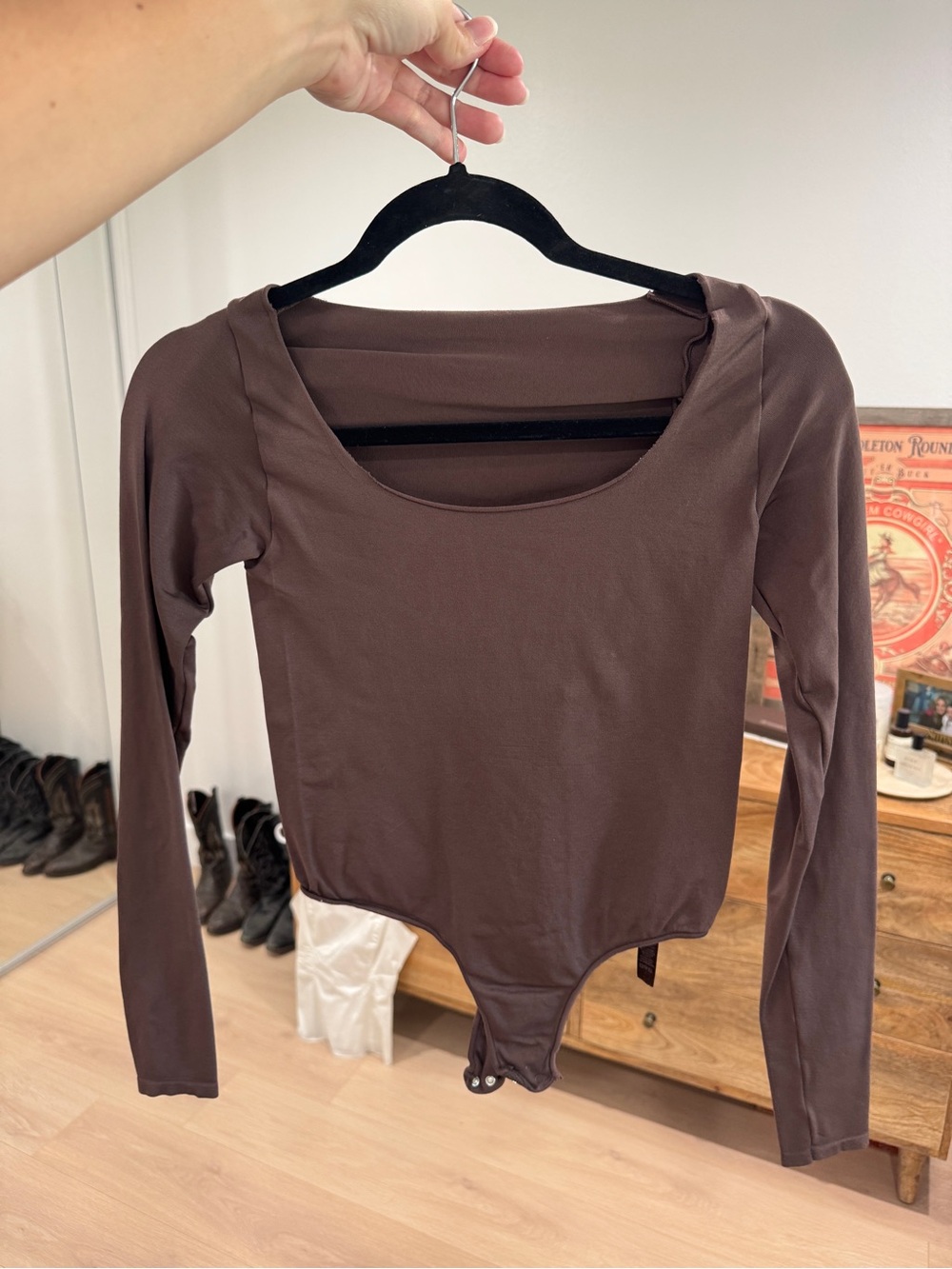 Skims Long Sleeve Scoop Neck Bodysuit in Brown